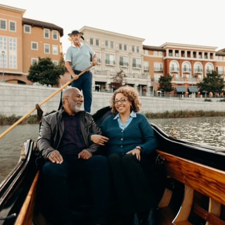 a group of people on a boat in the water