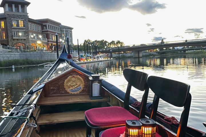 a boat is docked next to a body of water