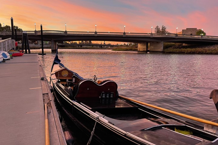 a train crossing a bridge over a river