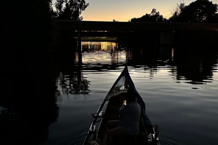 a sunset over a body of water