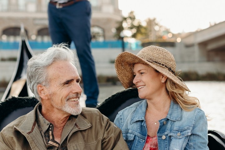 a group of people sitting on a bench